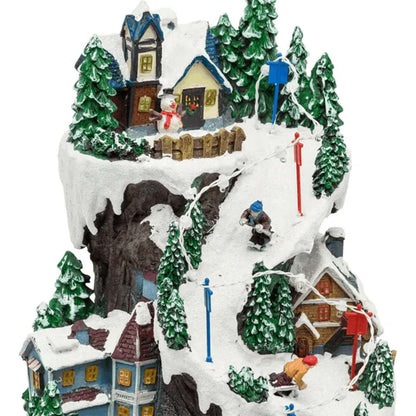 Villaggio di Natale innevato con luci e treno in movimento 21x21x38 cm