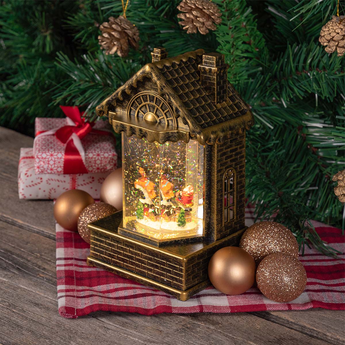 Casetta natalizia luminosa LED con glitter h 19,5 cm